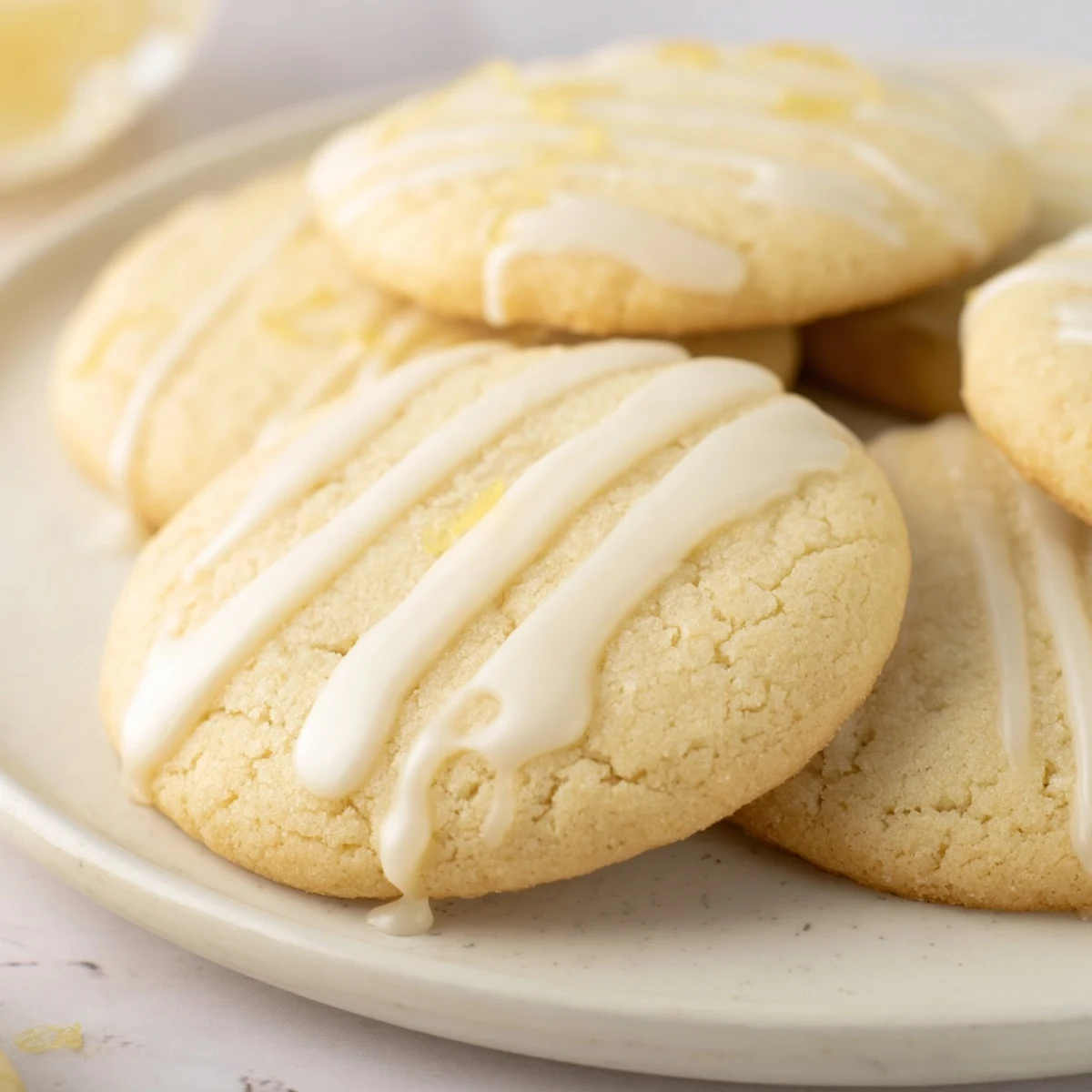 Close-up of freshly baked Holiday Cookies with Icing Drizzle, perfect for a sweet holiday treat.