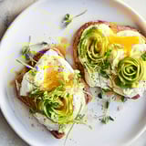 Beautiful plate of Cloud Toast 2.0: Toasted sourdough topped with soft baked egg and avocado.