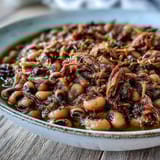Savory Crock-Pot Black-Eyed Peas with Smoked Turkey served steaming hot in a bowl, perfect alongside fluffy white rice or warm Southern cornbread.