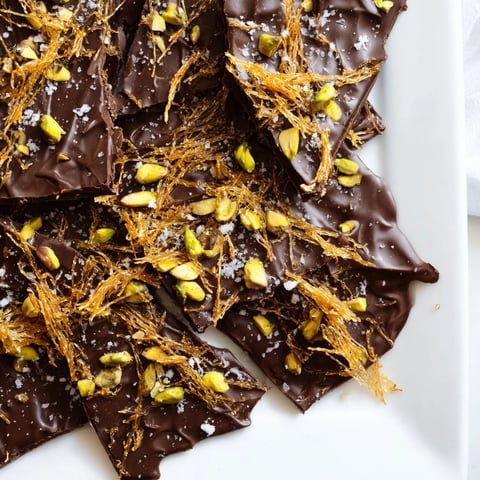 Kataifi Chocolate Crunch Bark: a close-up of the beautiful dessert, with golden kataifi and dark chocolate.