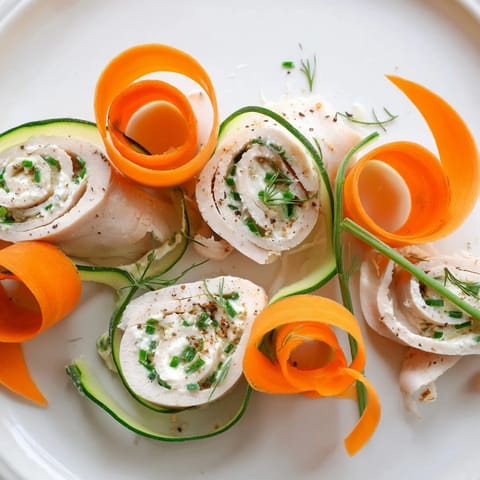 Appetizing The Ribbon Dancer, featuring colorful spiral-wrapped turkey rolls, perfect for a light, gluten-free snack.