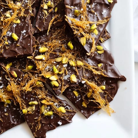 Kataifi Chocolate Crunch Bark: a close-up of the beautiful dessert, with golden kataifi and dark chocolate.