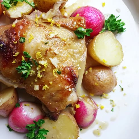 Juicy roasted radish and chicken sheet pan dinner with crispy skin, tender veggies, and a zesty lemon finish, ready to serve.