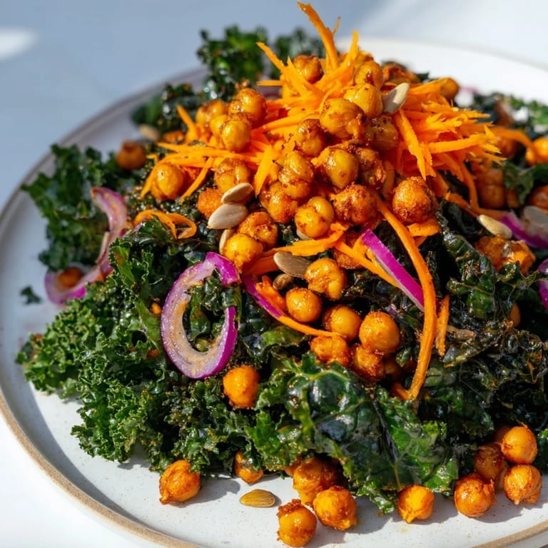 This delicious kale salad with roasted chickpeas features tender, massaged kale and crunchy spiced chickpeas ready to eat.